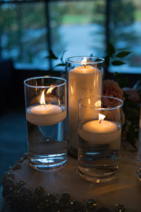 Floating candles in glassware
