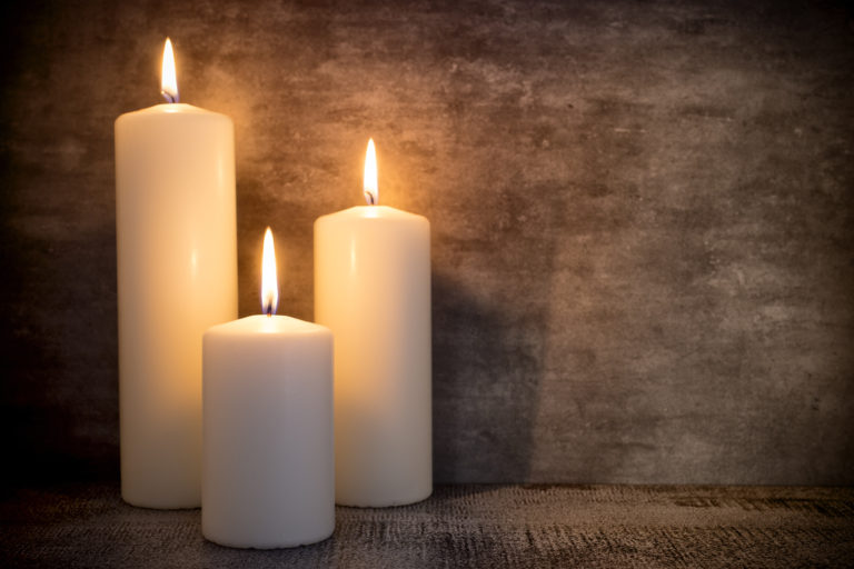 A trio of white candles
