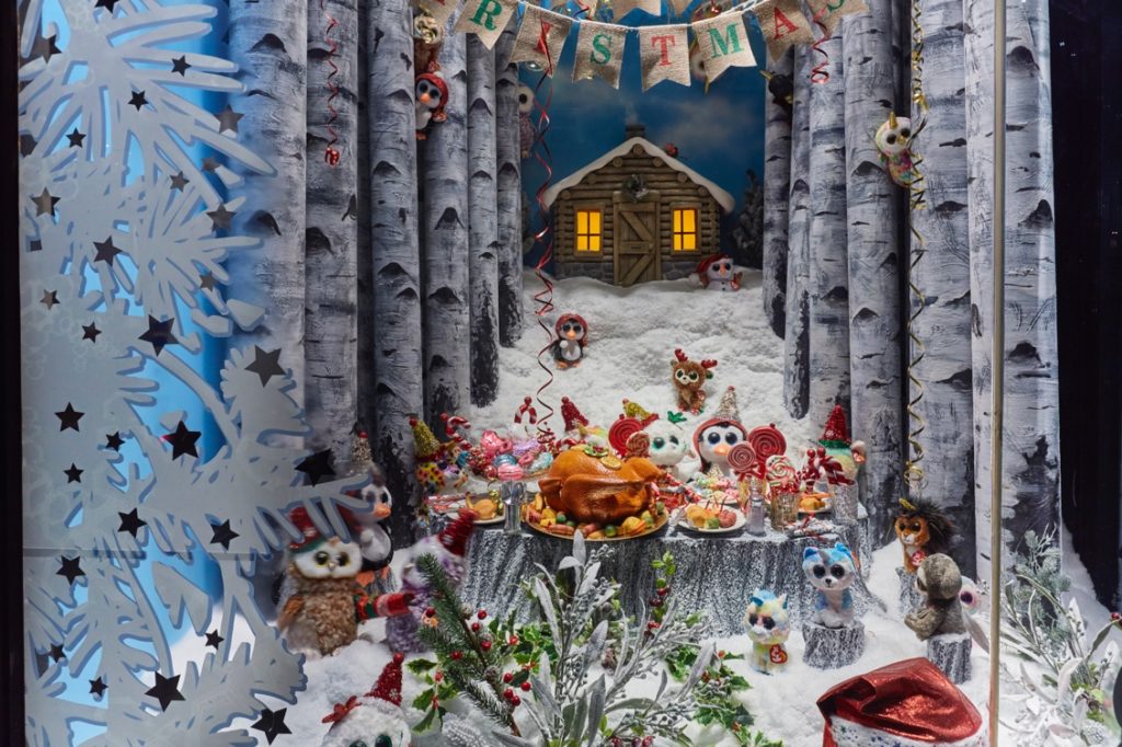 3D cabin and avenue of silver birch trees by Propability and Flourish Trading for Hamleys window
